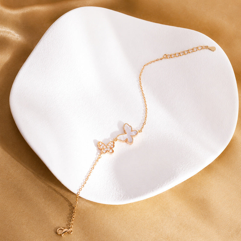 Grace in Motion-White Mother-of-Pearl Double Butterfly Bracelet