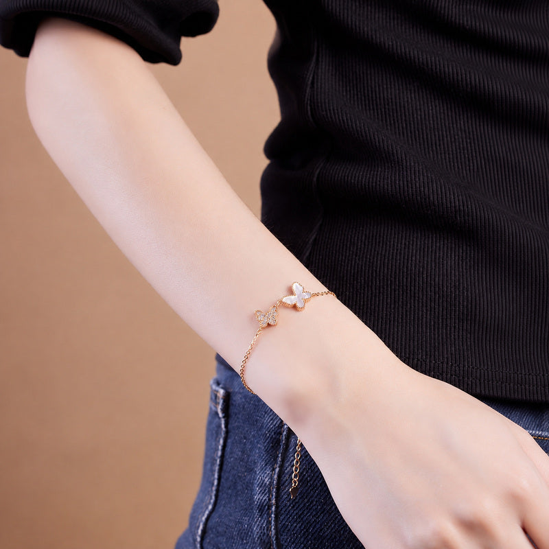 Grace in Motion-White Mother-of-Pearl Double Butterfly Bracelet