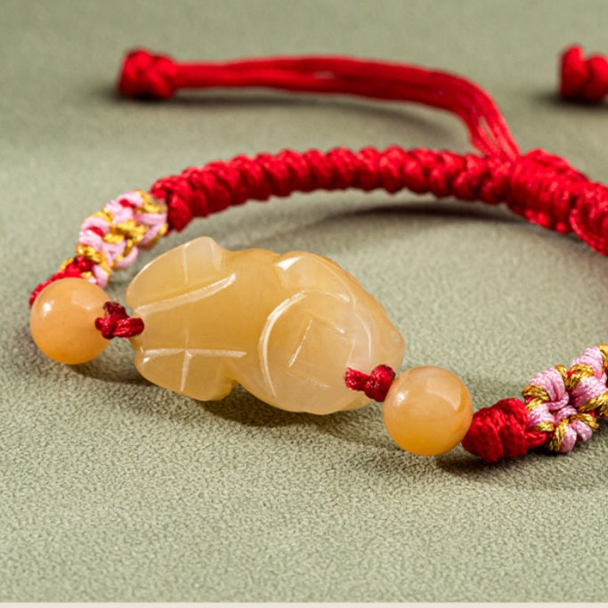 Hand-Woven Golden Silk Jade PiXiu Bracelet ¨C Protection. Peace & Vitality