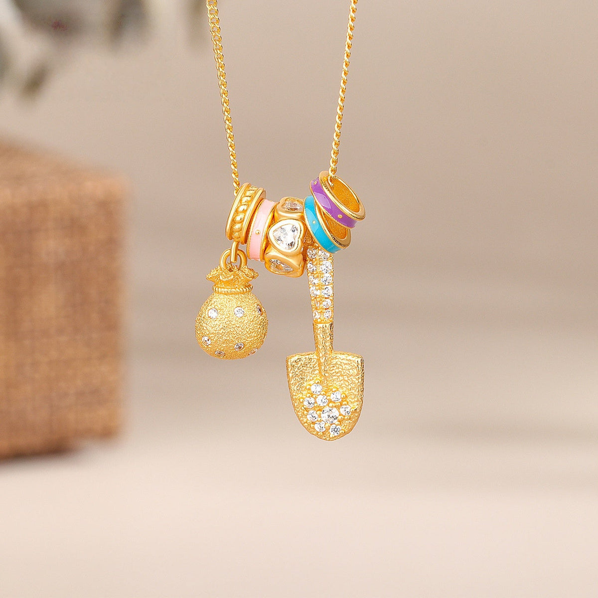 Gold Shovel & Blessing Pouch Necklace ¨C Dig for Joy and Blessings