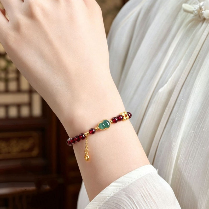 Harmony in Motion-Green Jadeite Gourd Garnet Bracelet