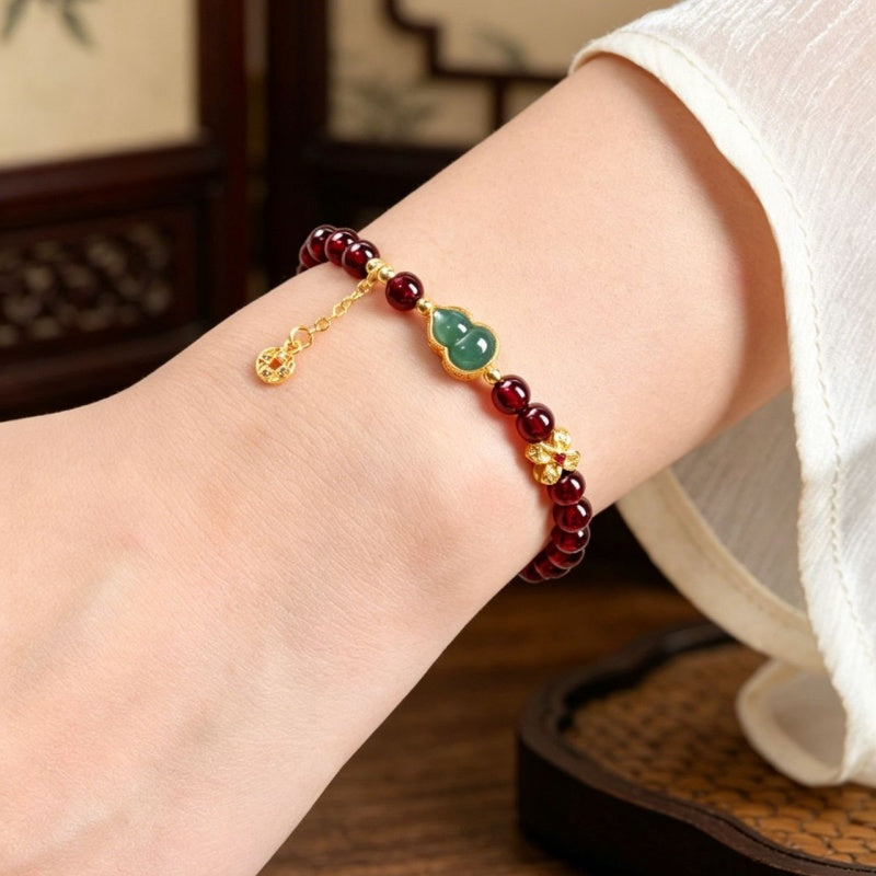 Harmony in Motion-Green Jadeite Gourd Garnet Bracelet