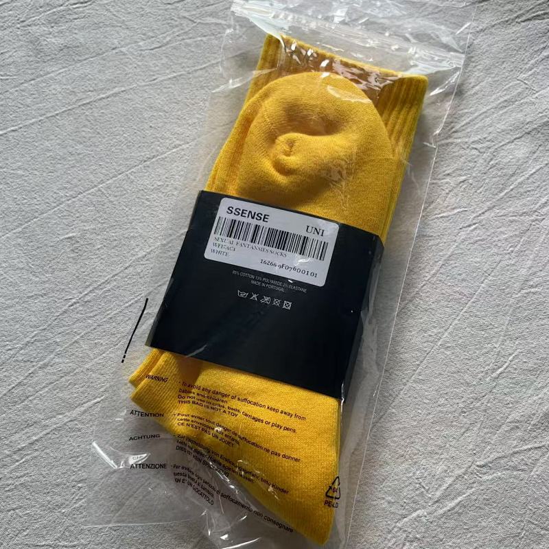 Yellow Crew Socks with Red Logo Design