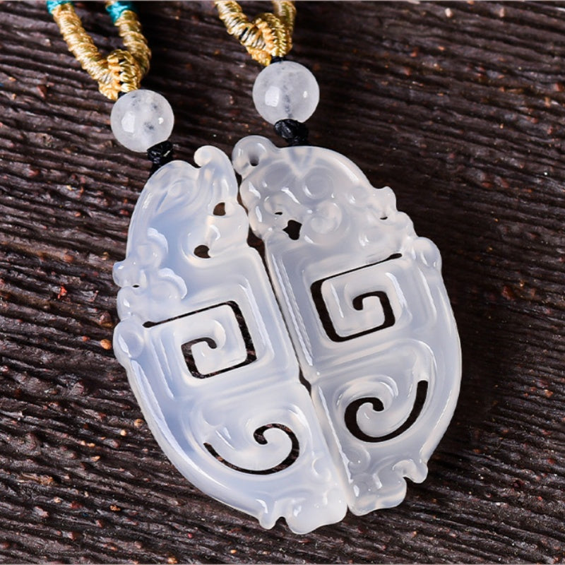 The Eternal Bond: Yin & Yang White Agate Dragon & Phoenix Pendants (Pair)
