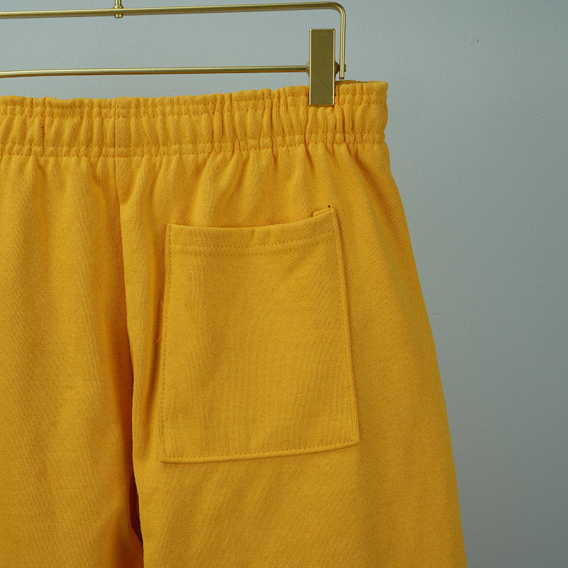 Sp5Der Logo Sweatpants Yellow