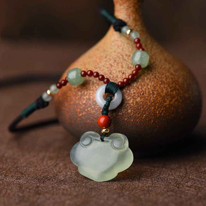 Feng Shui Clouds Green Jade Wealth Pendant