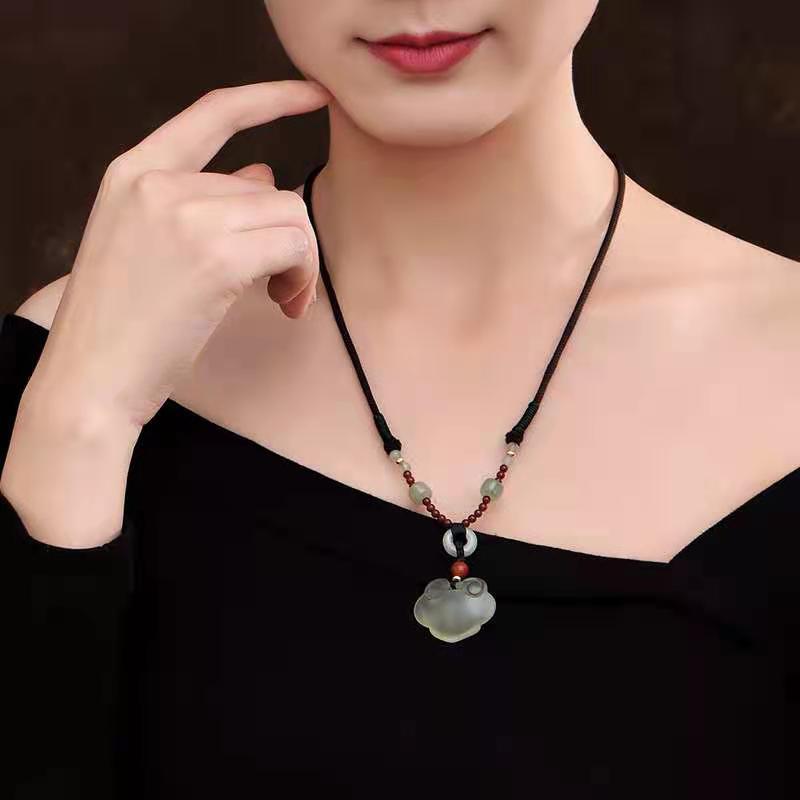 Feng Shui Clouds Green Jade Wealth Pendant